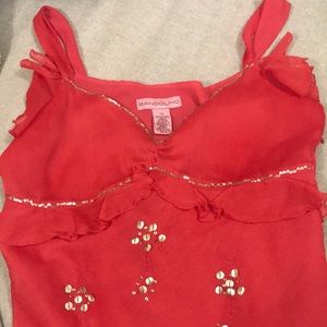 Dark orange and gold stitching in front